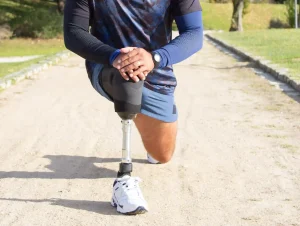 a man doing daily workout with an above knee prosthetic leg