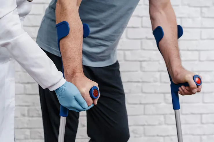 Various types of prosthetic limbs and orthotic braces used in patient treatment
