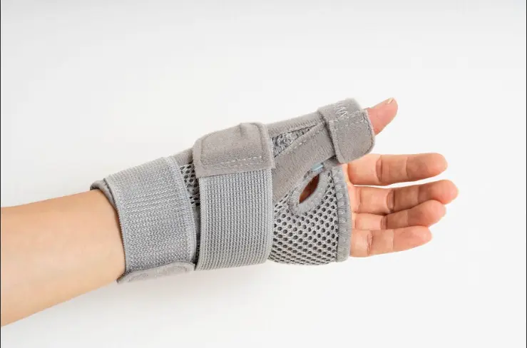 Wrist hand orthosis supporting wrist and hand for carpal tunnel and fracture recovery
