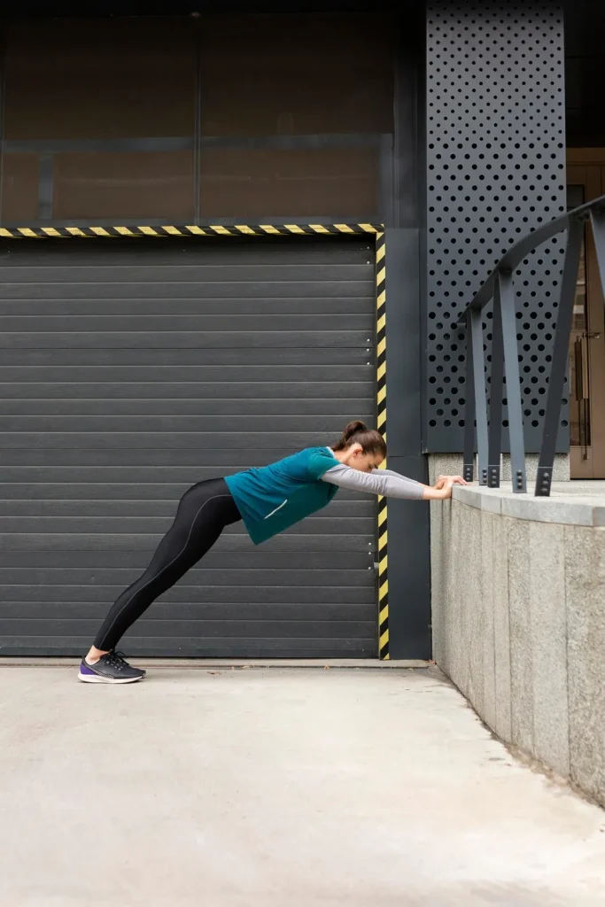 Diabetic patient doing wall push-up exercise at home to build strength and manage blood sugar